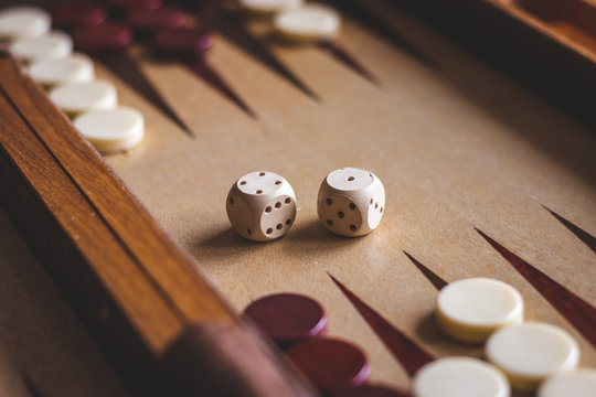 Dice on backgammon board game. Selective focus
