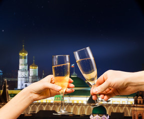 Moscow kremlin with glasses of champagne, mixed media