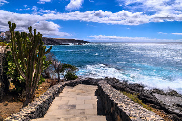 Coastline in the small fishing village of Alcala on a bright sunny day. Tenerife, Canary Islands, Spain.