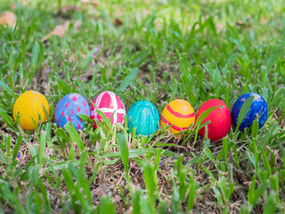 Row of Easter eggs in Fresh Green Grass.