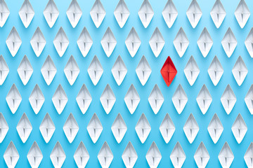 Paper ship that are different from other ships in the group on blue background, Business for new...