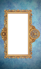 Gold Color Antique Vintage Classic Baroque Stylish Empty Photo Painting Frame in Grunge and Retro Background for Home Interior and Garden Furniture made from Wood and Metal
