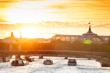 Seine river sunset and dome of Grand Palais 