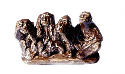 monkey figures depicting the wisdom of Budha - The wise monkeys.