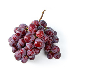 A bunch of red grapes isolated on white background