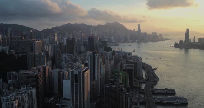 Drone aerial shot of modern skyscrapers in Hong Kong City. Hong Kong is a popular tourist travel destination in Asia.