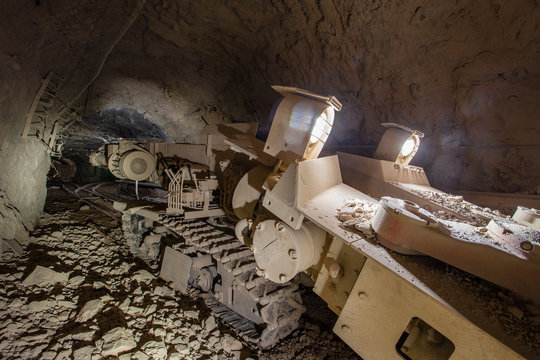 Underground gold ore mine shaft tunnel gallery passage with continious loader