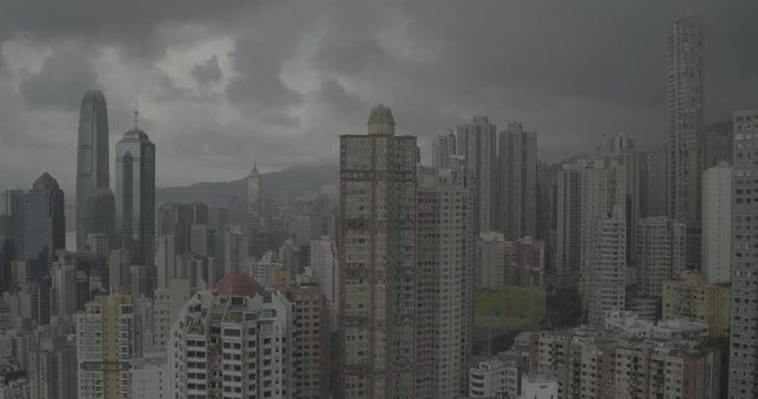 Aerial view of Hong Kong city, financial and business district, China, Asia. Drone shot lowering.
