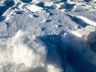 Fototapeta na wymiar Pieces of snow. White snow in chunks.