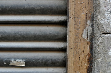 close up street wall detail with metal door