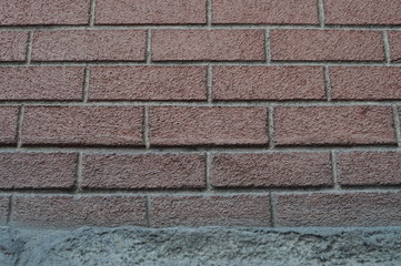 expoxed facing street old brick pattern