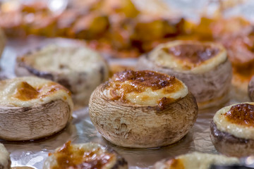 Staffed mashrooms baked in the oven on a foil