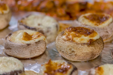 Staffed mashrooms baked in the oven on a foil