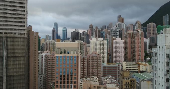 Drone aerial shot of Hong Kong Island modern skyscraper high-rises. Hong Kong is a popular tourist travel destination in Asia. China.