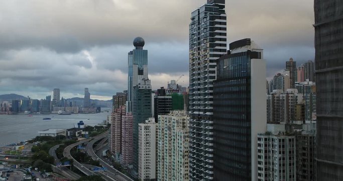 Drone aerial shot of Hong Kong Island modern skyscraper high-rises. Hong Kong is a center of finance business in China. Asia.