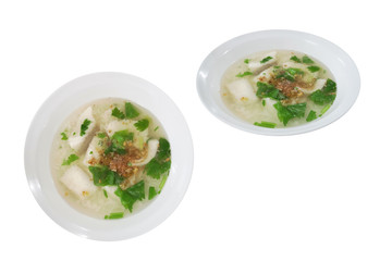 Fish Porridge in a white bowl top and side isolated on white background with clipping path.