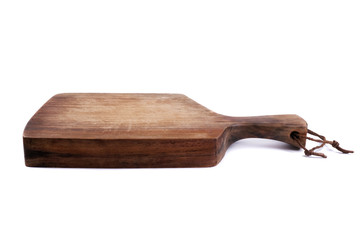Old wooden cutting board on a white background.