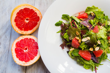 tasty summer salad on a wooden table