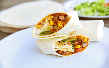 Chili Con Carne Burrito with fresh vegetable.