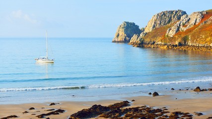Yacht on anchor in a bay of Celtic sea at the coast of Brittany © Alex Stemmer