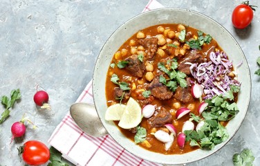 Beef Pozole. with beef and chickpeas. festive Mexican rich soup.