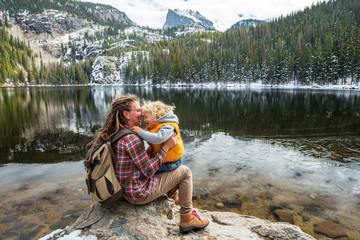 Family in Rocky mountains National park in USA