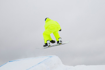 snowboarder jumping in air