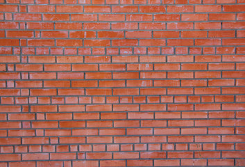 old wall of boards peeling paint red burgundy