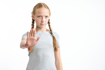 No, disagreement. A girl of 13 years old stretched out her hand forward as a sign of refusal....
