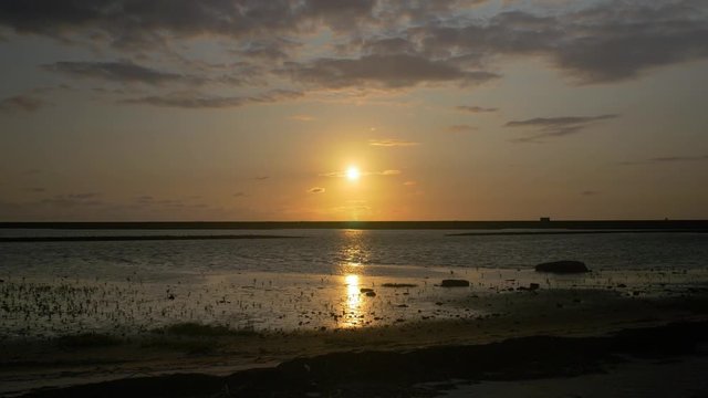 Sunset at the north sea on the isle of sylt at the rantum becken