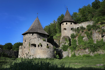 Fototapeta na wymiar Ancient buildings and defense tower in Kamenets-Podolskiy in Ukraine