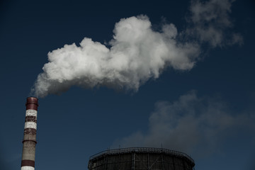 Air pollution. Harmful emissions. Bad ecology. Smoke from factory pipe Dirty smoke on the sky,...