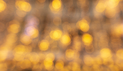 Obraz premium Golden bokeh lights as abstract background