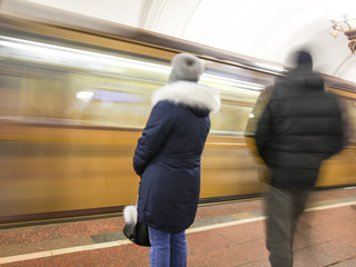 The train moves to the subway as a background