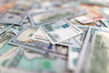 Dollars and Russian rubles on the table as background