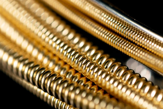 Strings for guitar as an abstract background