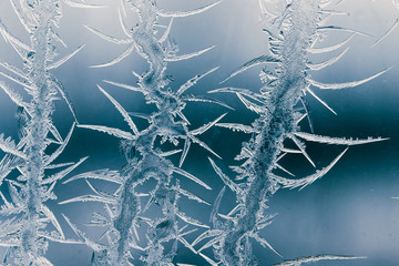 Snow patterns on glass as an abstract background