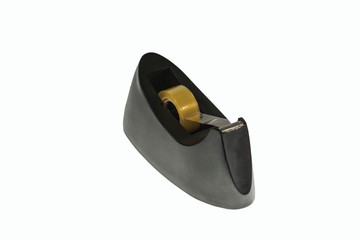 Close up view of black tape holder isolated. Office table equipment. Stationery concept.