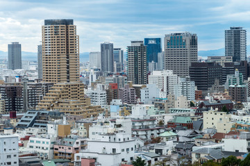 Fototapeta premium Cityscapes of Kobe city in winter Skyline, office building and downtown of Kobe Bay, Japan, Kobe has been an important port city.