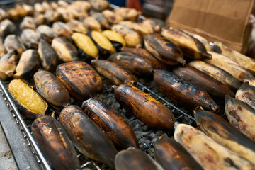 Street barbecue with grilled bananas in Thailand