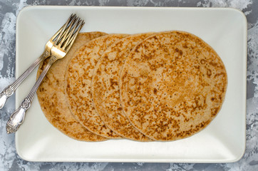 Pancakes from spelled flour without eggs for breakfast
