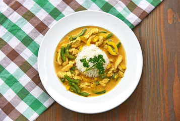 Stir Fried turkey with yellow curry and paprika in cream sauce Served with rice