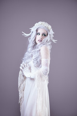 Portrait of a young princess in white dress