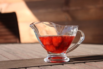 Strawberry jam in the sunlight 