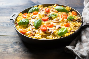 casserole  pasta with mushrooms, sausage and cheese