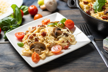 casserole  pasta with mushrooms, sausage and cheese