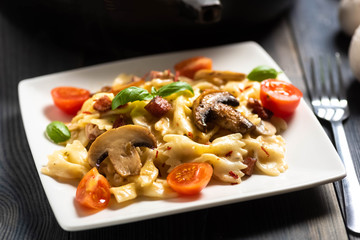 casserole  pasta with mushrooms, sausage and cheese