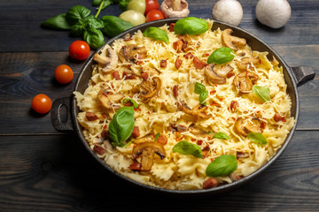 casserole  pasta with mushrooms, sausage and cheese