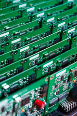 Microelectronics Industry and Manufacturing. Stack of Produced  Printed Circuit Boards with Surface...