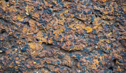 The surface of the rust is very dense and rough.
